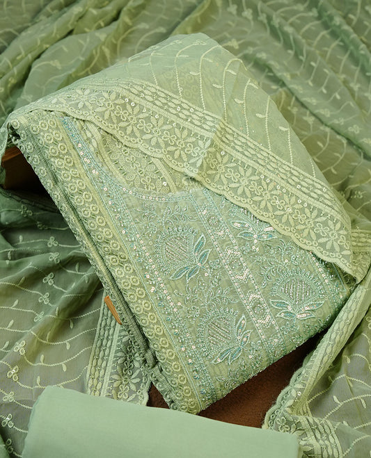 Pastel green colour churidhar Material featuring Intricate Thread Embroidery with Mirror and Cut Beads Work on the Front Panel, paired with an All Over Embroidered Net Dupatta and Matching Bottom