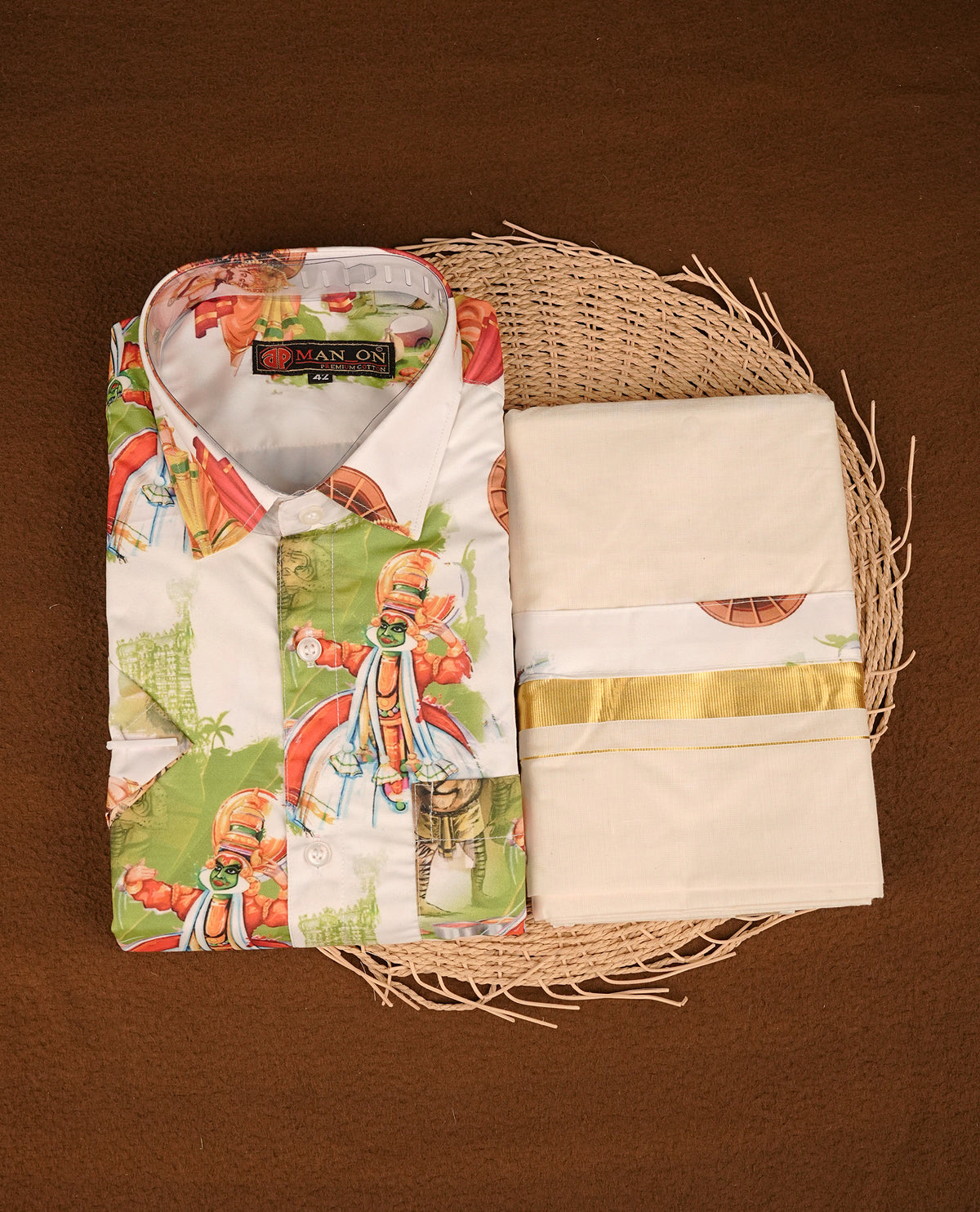 Cream colour shirt featuring  Indian art from printed body, paired with cream colour double dhoti featuring a gold kara with Same printed border.