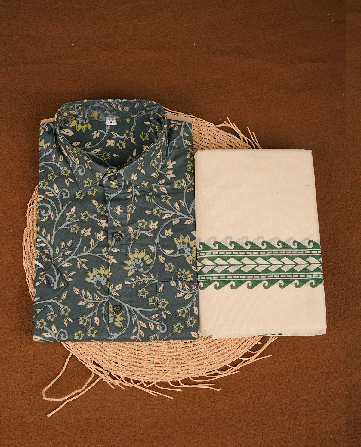 Dark Teal colour shirt featuring Floral Pattern printed body, paired with cream colour double dhoti featuring printed border.