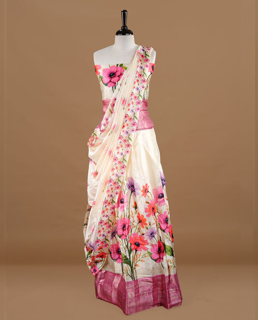 Off white colour semi stitched half saree featuring elegant Magenta colour floral prints, paired with a contrast Magenta with traditonal zari border and matching printed dupatta ,paired with matching blouse piece.