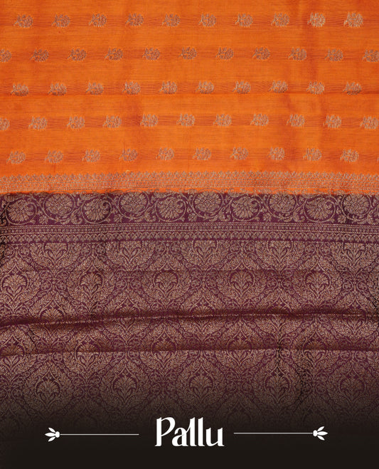 Orange colour Banaras tussar silk saree featuring elegant gold zari buttas across the body, complemented by a contrast chocolate brown border with rich zari detailing. Comes paired with a matching blouse piece.