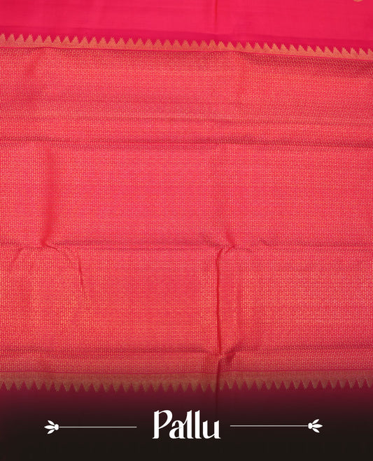 Pani Pink colour pure traditional Kancheepuram silk saree adorned with an elegant zari elephant motif on the body, complemented by a simple gold zari woven border paired with a matching blouse piece.