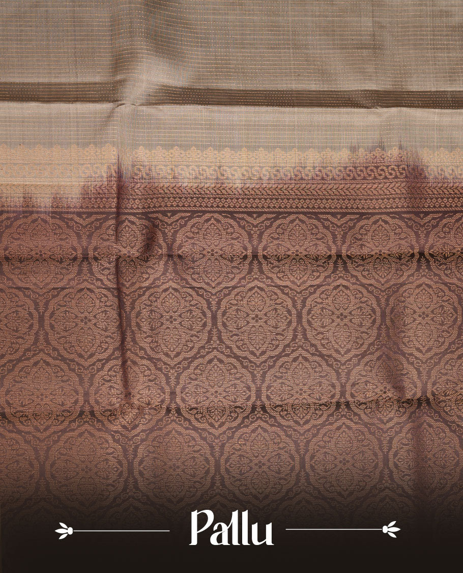 Grey colour soft silk saree featuring vertical lines on body, complemented by contrast burgundy brown with peacock buttas border.