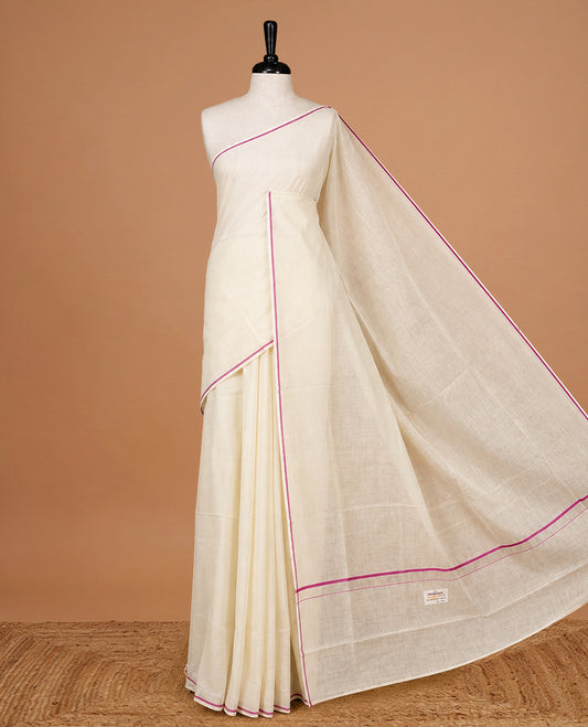 Cream Colour  Cotton Kerala Saree Featuring A Classy Plain Body For Effortless Elegance, Enhanced By A Minimalist Magenta Border, Paired With A Matching Blouse Piece.