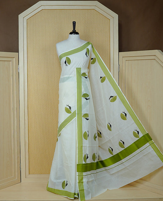 Cream colour Cotton Kerala saree Featuring Classy Plain body for Effortless Elegance, enhancing Green with Peacock Printed border, paired with matching blouse piece.