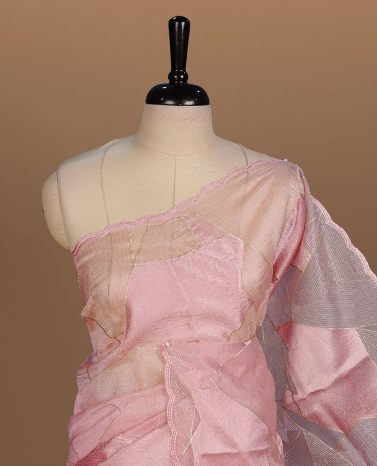 Peach colour Organza designer saree featuring a thread geometric pattern across the body, enhanced with a piping border and cut beats work on matching blouse piece.
