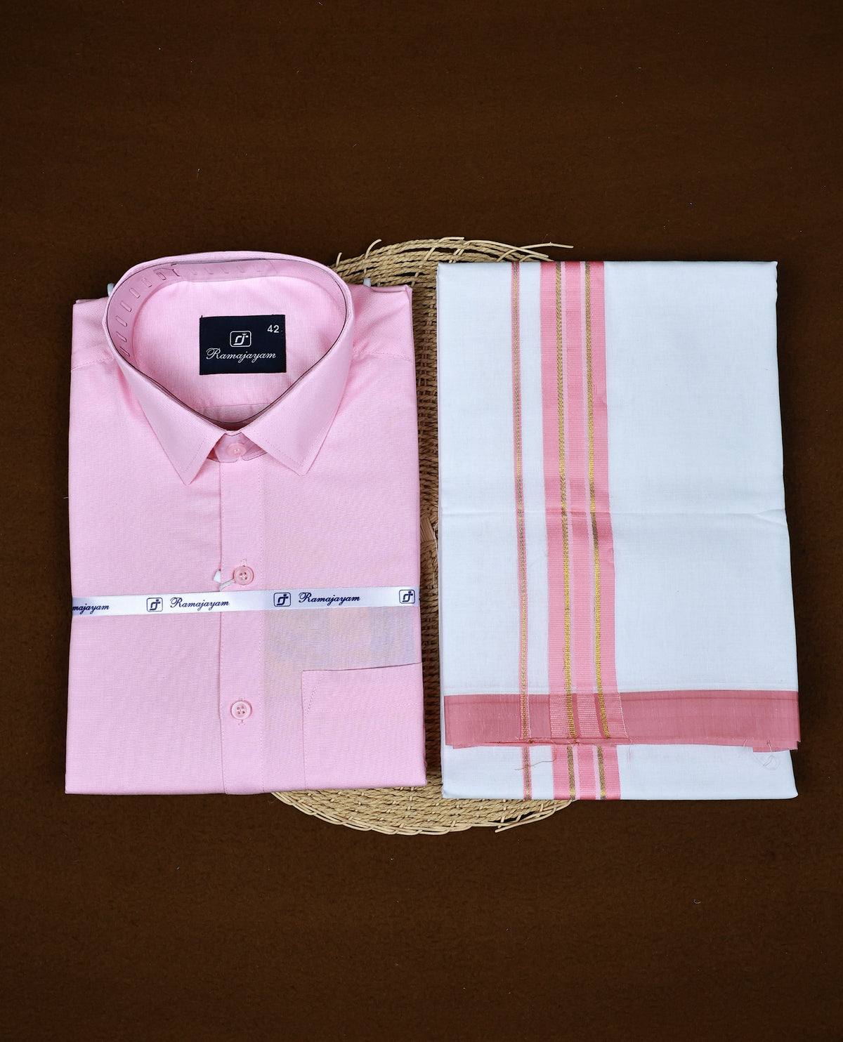 Pink Colour  RAMAJAYAM shirt paired with a matching dhoti, finishing with a Pink & gold kara