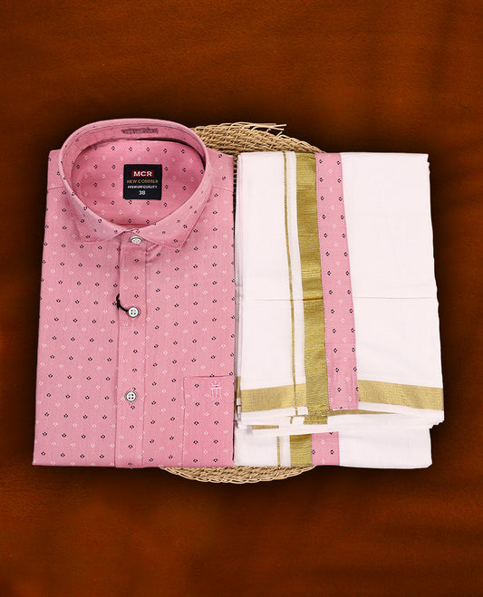 Pink colour MCR full sleeve shirt with delicate printed motifs, paired with a classic white dhoti featuring an elegant golden zari kara and a matching pink printed border.