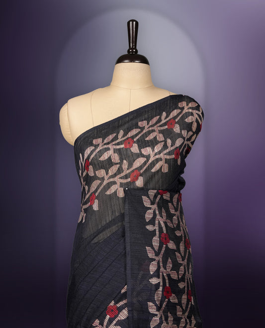 Navy blue colour saree with elegant beige & red colour leaf & flower work and subtle texture & Paired with a matching blouse, its perfect for festive events, receptions, or traditional gatherings with a touch of grace.