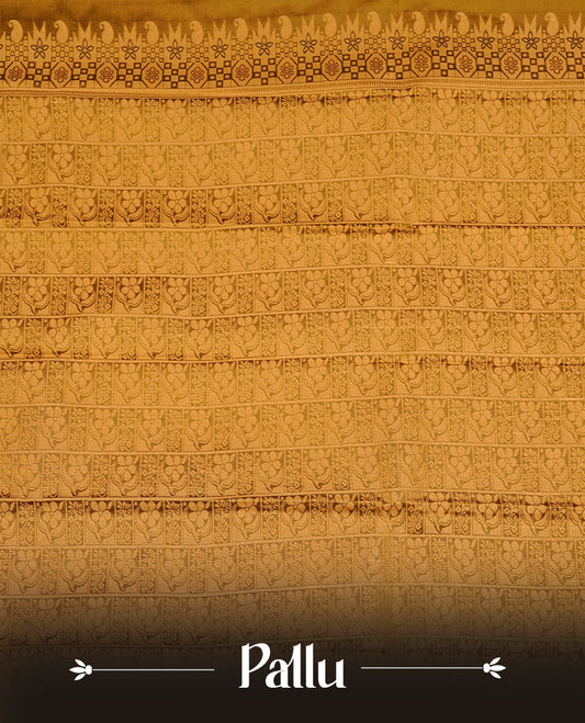 Olive colour soft silk saree featuring gold zari motifs on body, complemented by self colour with zari border, paired with matching blouse piece.