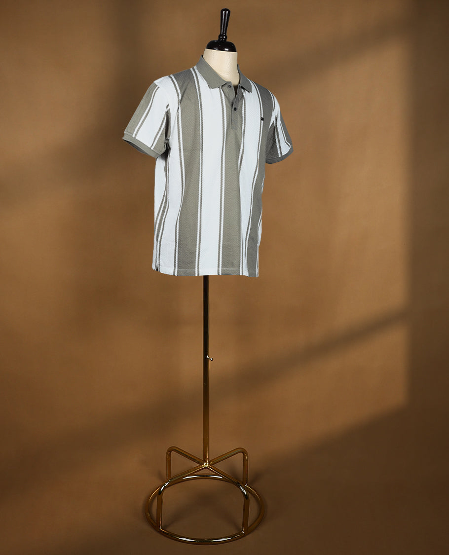 Grey and white striped men’s polo T shirt featuring a classic collar with button placket, short sleeves, and a regular fit crafted from soft, breathable fabric for everyday comfort and style