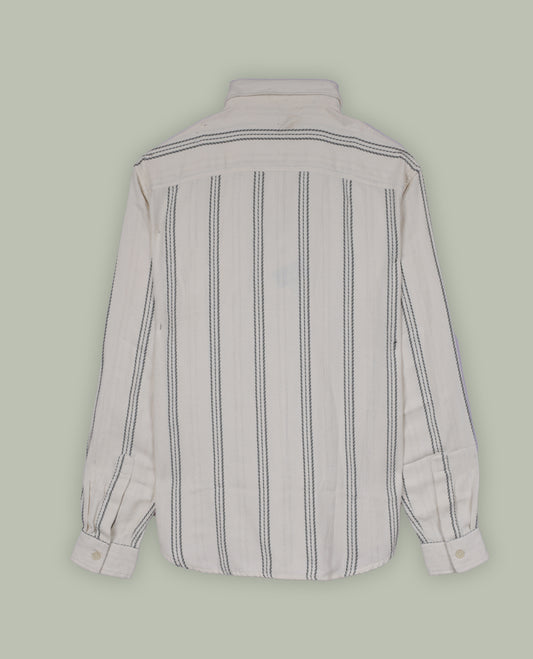 Cream colour shirt with pastel green vertical stripes, crafted in soft cotton for all day comfort, Featuring full sleeves, dual chest pockets, and a classic collar, it delivers a bold yet timeless casual style.