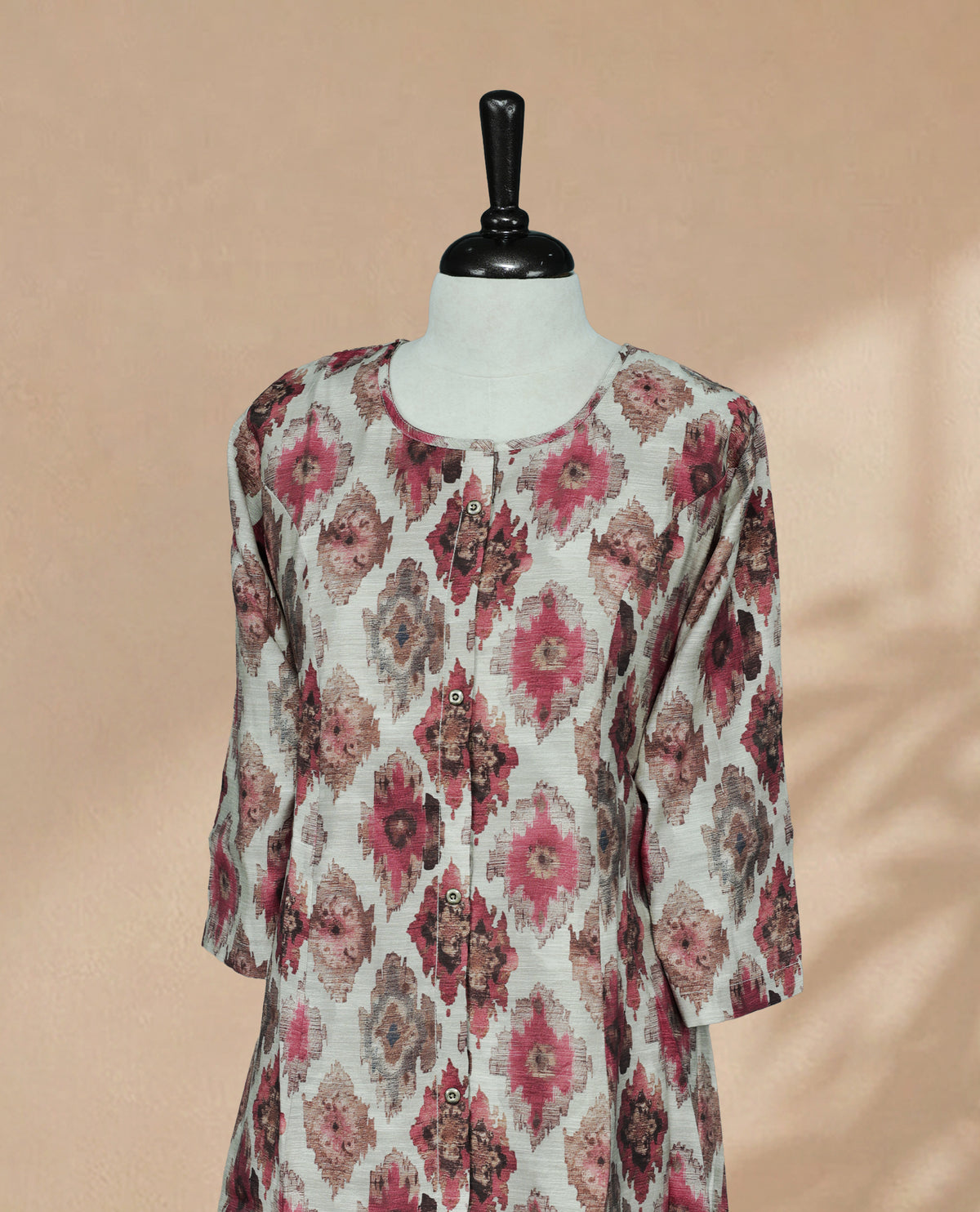 Grey colour  Kurti featuring digital prints on the body, a U-shaped neckline with buttons, and 3/4 sleeves.