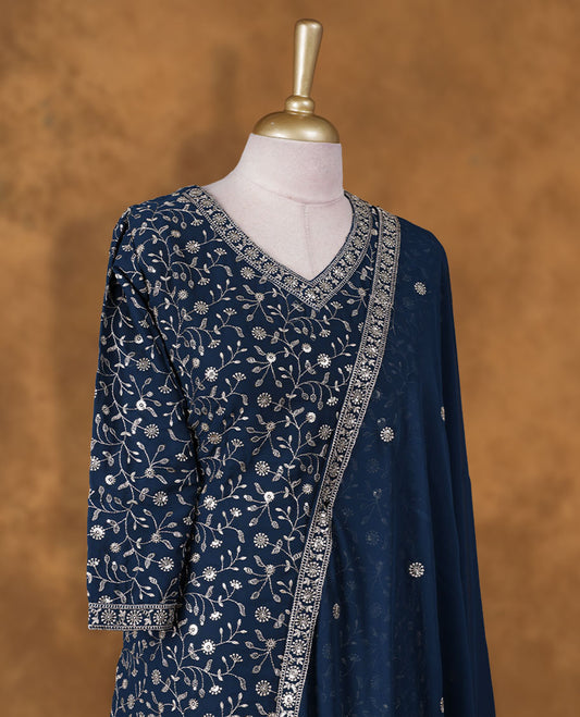 Dark blue colour sharara set featuring gold thread and beats embroidered neckline, sleeves, and thread embroidery on body , Paired with a matching dupatta