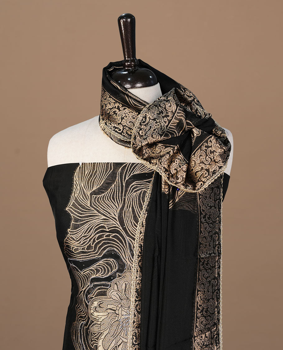 black colour churidhar material featuring gold thread pattern on body, paired with matching bottom and Dupatta.