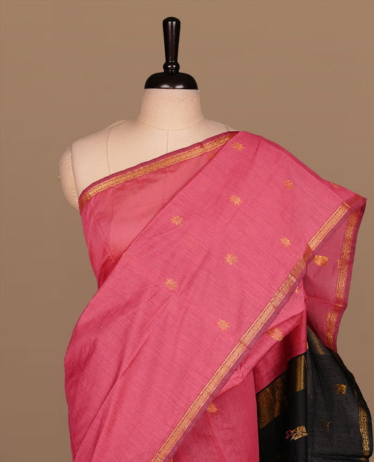 Pink colour Kalyani cotton saree features elegant gold zari motifs across the body, a classic gold zari border, a striking contrast pallu, and a matching blouse piece.