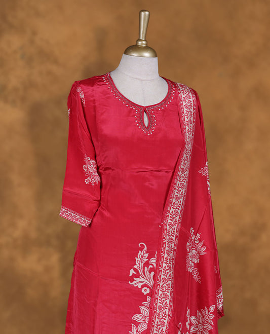 Rani pink colour churidar set featuring thread & cut beats embroidered on neckline, sleeves, and thread embroidery on body , Paired with a matching dupatta