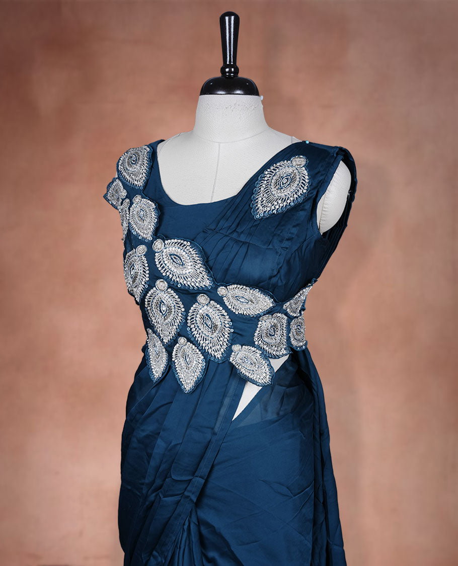 Deep Teal colour ready to wear saree featuring bold silver applique embroidery on the drape, paired with a sculpted matching blouse
