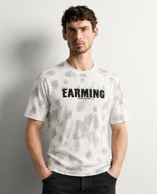 Beige colour t shirt featuring round design neck, elegant Design body with a text, Half sleeve.