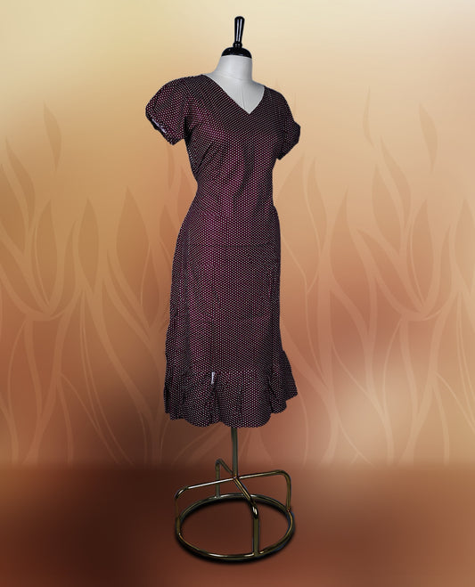 Brown colour nightwear with tiny off white colour polka dots, V neckline, and flutter sleeves & The flared hem with pleats adds a chic touch, Ideal for casual wear, office looks, or relaxed outings with a stylish twist.