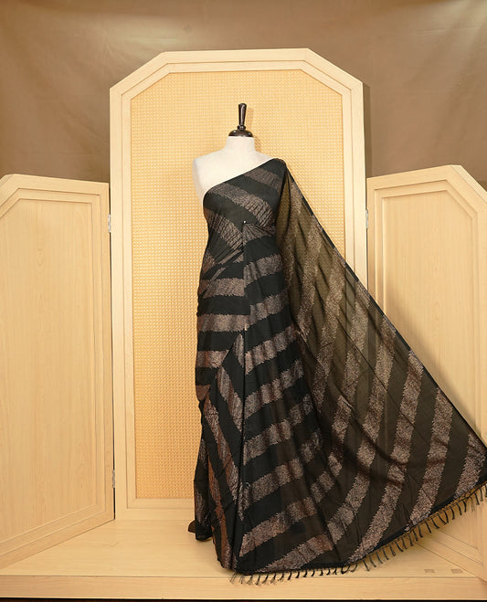 Black colour Vijitra silk Saree Featuring Leheriya style gold Printed body, complemented by contrast pallu & tassels