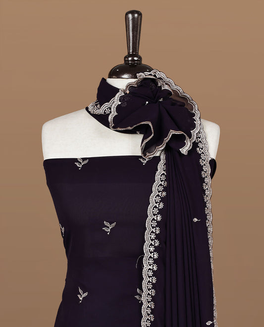 Violet colour churidhar material featuring gold thread floral pattern on body, paired with matching bottom & dupatta.