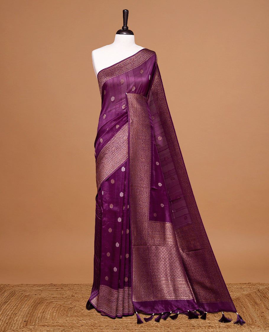 Deep Purple colour Semi banaras tussar georgette Saree featuring Antique zari motifs on body, enhanced with antique zari border, paired with a matching blouse piece.