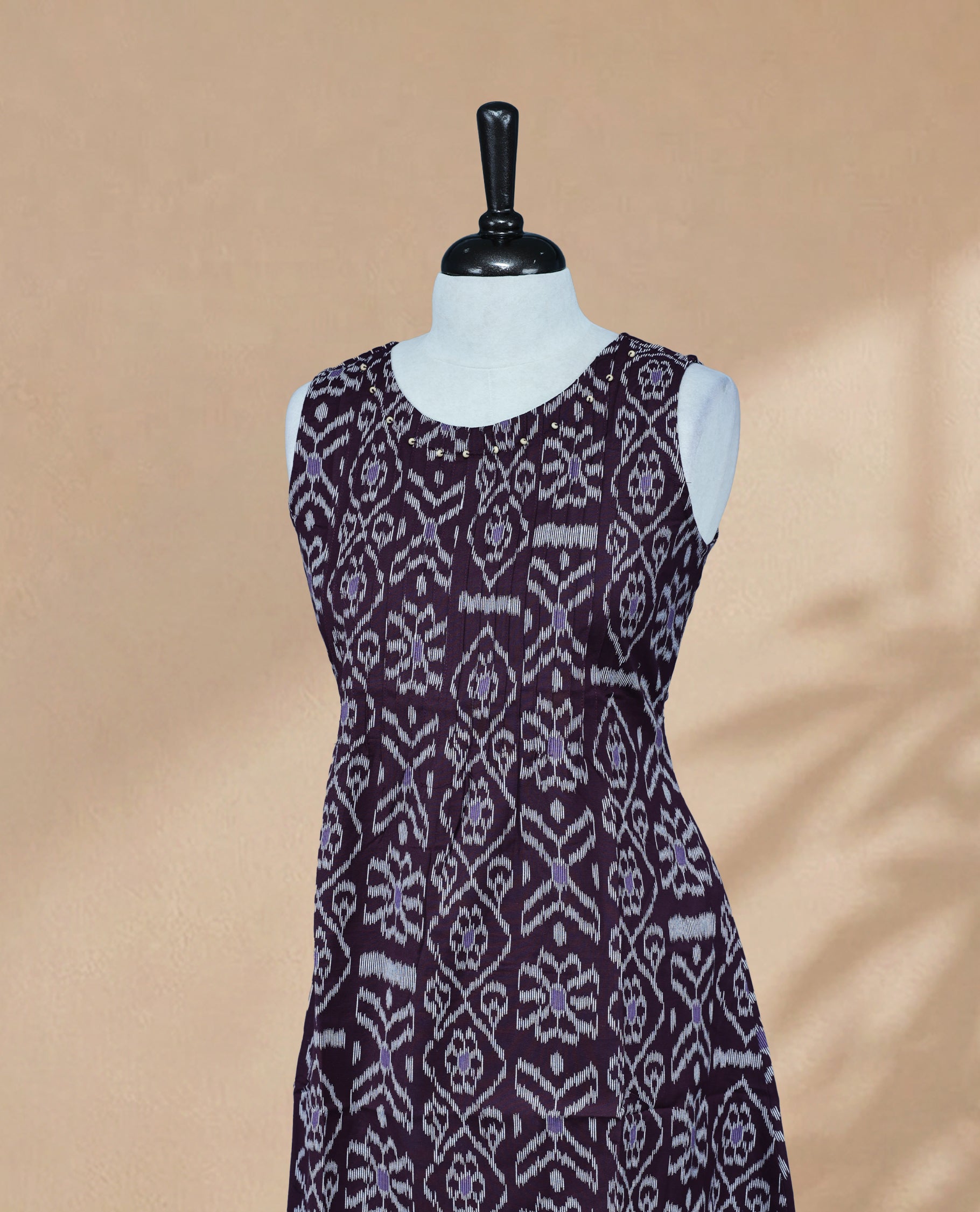Dark Wine Colour Kurti Featuring Digital Prints On Body, Bead Work On Neck Yoke, Round Neckline & Sleeveless