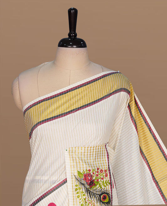 Off white color kerala cotton saree featuring gold zari stripes on body, complemented by Red & black, gold zari with peacock leaf printed border, paired with matching blouse piece.