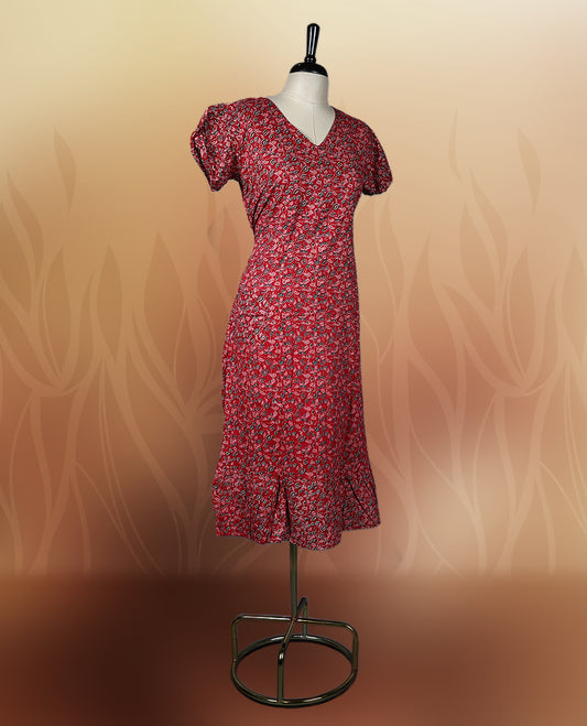 Red colour printed nightwear with floral patterns, V neckline, and short puff sleeves, Tailored for a flattering fit with a flared hem & perfect for casual outings or daily ethnic wear with comfort.