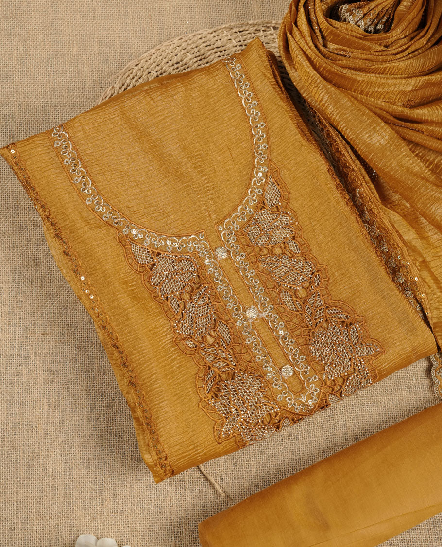 Mustard colour churidar set with stone and thread embroidery and detailing, paired with matching pant and dupatta.