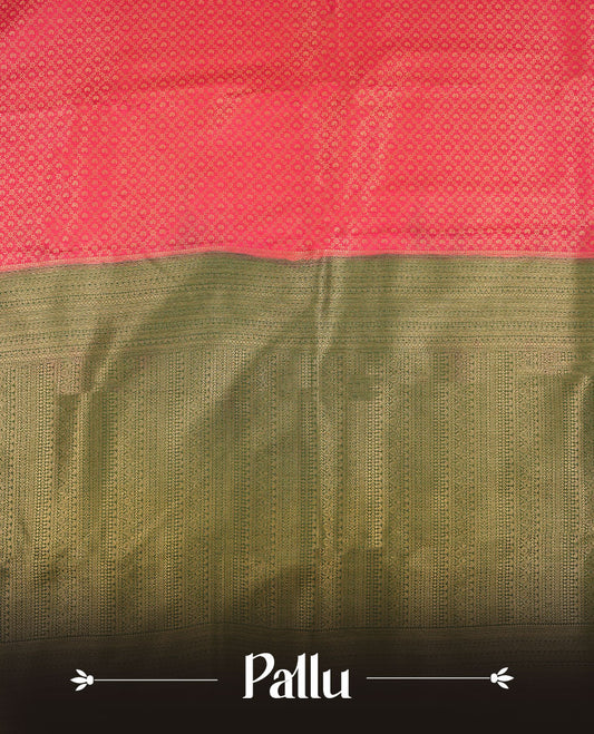 Magenta colour semi silk brocade saree featuring intricate Gold Diamond patterns across the body, complemented by a contrast Green colour woven border and pallu, paired with a matching blouse.