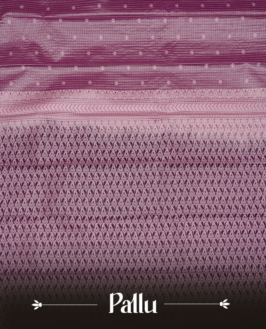 Lavender colour soft silk saree featuring rose Gold zari check & motifs on body, complemented by contrast purple colour with traditional border, paired with matching blouse piece.