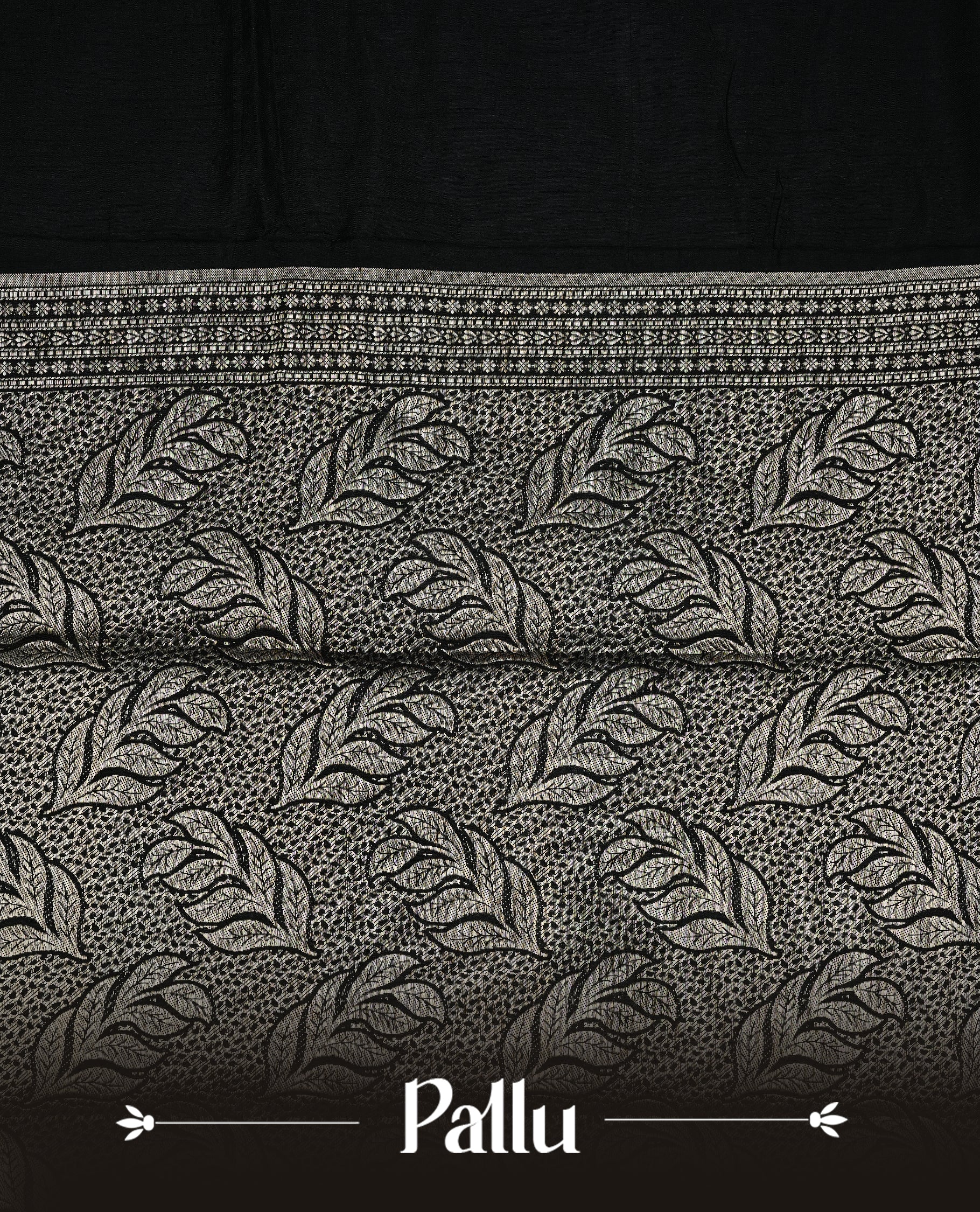 Black colour semi Tussar silk saree featuring an elegant plain body, complemented by a self colour border adorned with traditional gold zari floral kodi patterns. Comes paired with a matching blouse piece.