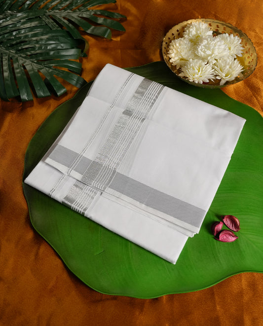 White colour cotton dhoti with elegant silver zari borders, combining tradition with style & Perfect for weddings, festivals, and spiritual occasions, offering comfort with a refined ethnic touch.