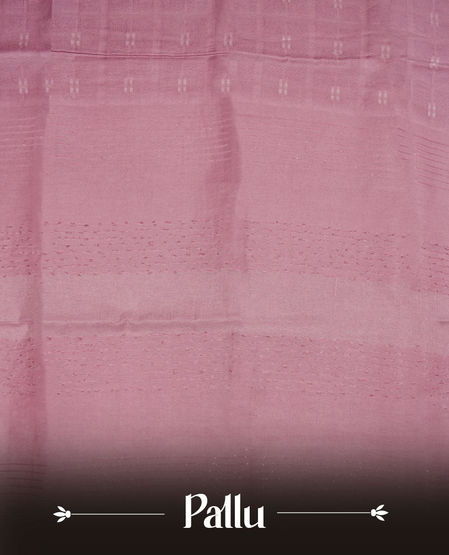 Baby pink colour semi jute saree highlighting white thread motifs on body, without border and paired with matching blouse.