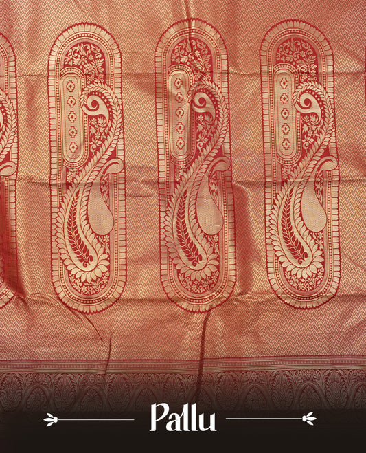 Cream colour semi wedding saree featuring light gold zari box with check with chakra across the body, complemented by maroon colour with  traditional border. Comes with a matching blouse piece.