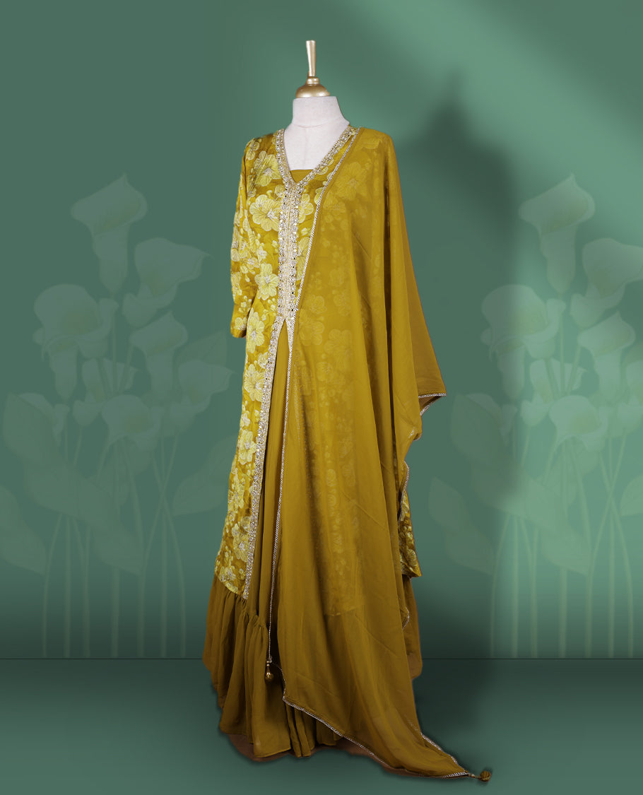 Mustard yellow Anarkali Suit with floral threadwork and sequin detailing on the front, Paired with a plain matching dupatta and gathered flared bottom & A perfect blend of elegance and festive flair.