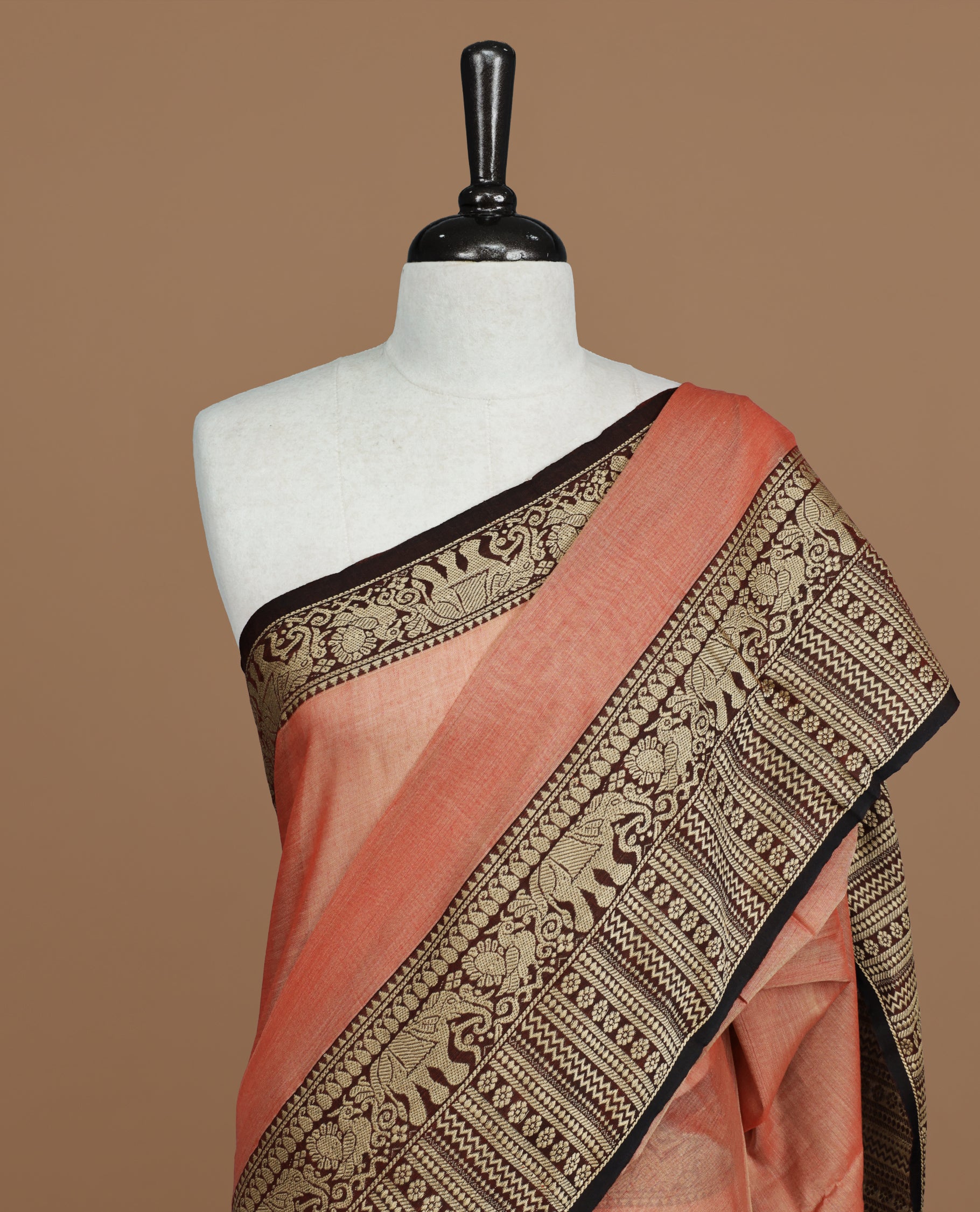 Peach colour Narayanapett cotton saree Featuring Elegant plain Body, complemented by Contrast Maroon colour with cream zari border, paired with matching blouse piece.