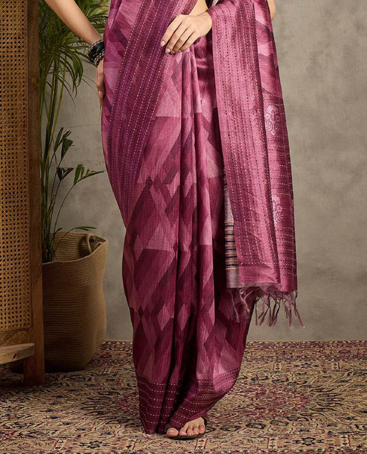 Grape toned semi Tussar saree featuring contemporary fancy prints across the body, enhanced with a subtle Katha style stitched border, paired with a matching blouse for a stylish and elegant ethnic look.