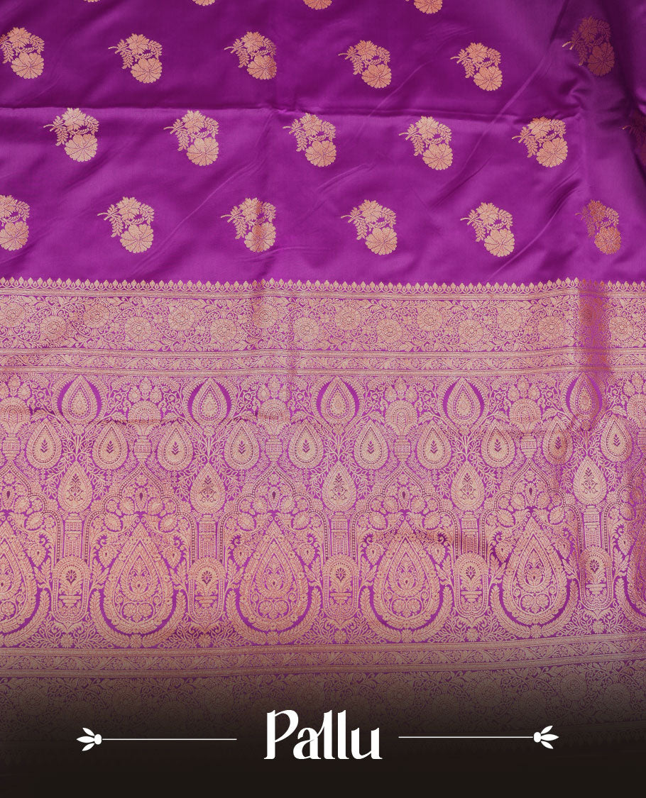 Purple colour Banaras Satin Crepe saree featuring gold zari buttas on the body, a richly woven traditional border with gold zari detailing, and paired with a matching blouse.