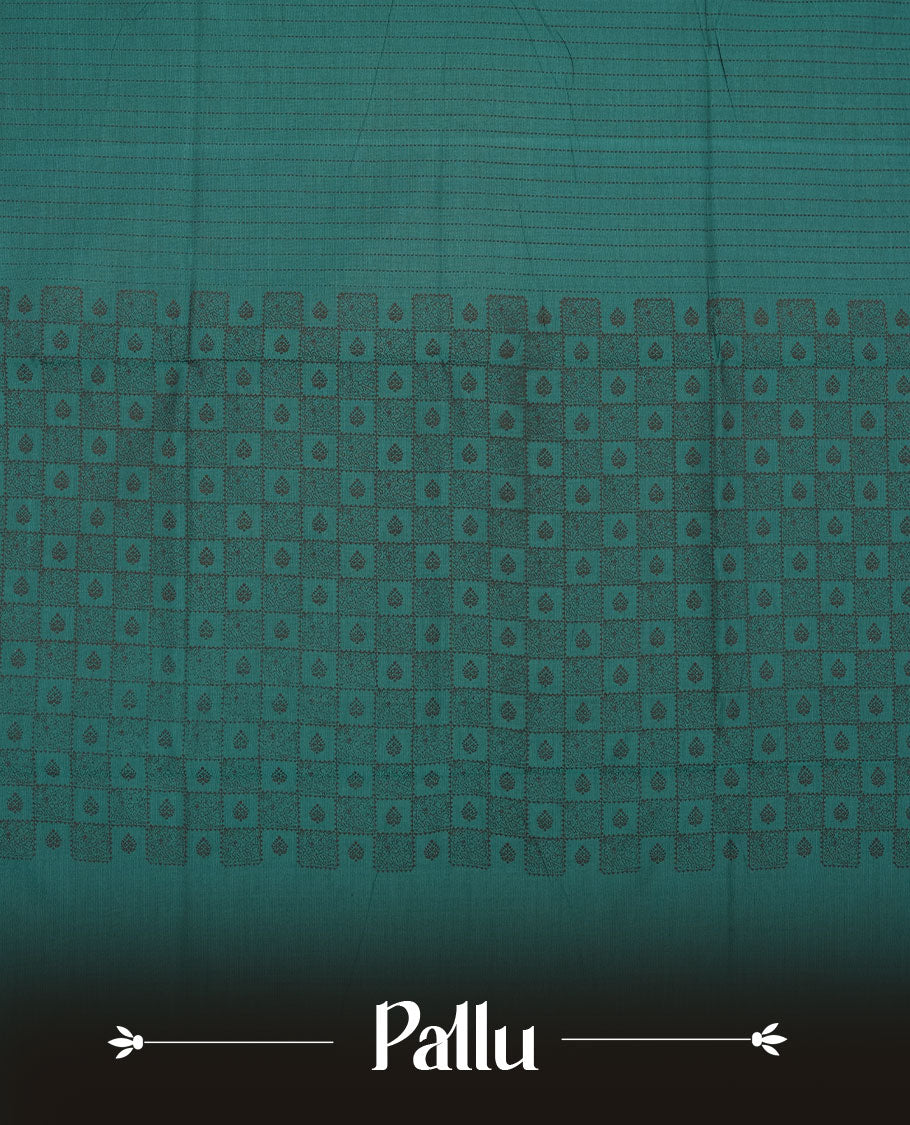 Dark Teal Green colour poly cotton saree with black vertical dotted line pattern on the body, paired with a matching pallu featuring black zigzag geometric border, and a coordinated all‑over black stylised fleur‑de‑lis printed blouse piece.