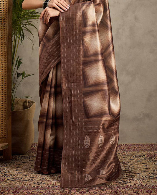 Brown toned semi Tussar saree featuring contemporary fancy prints across the body, enhanced with a subtle Katha style stitched border, paired with a matching blouse for a stylish and elegant ethnic look.