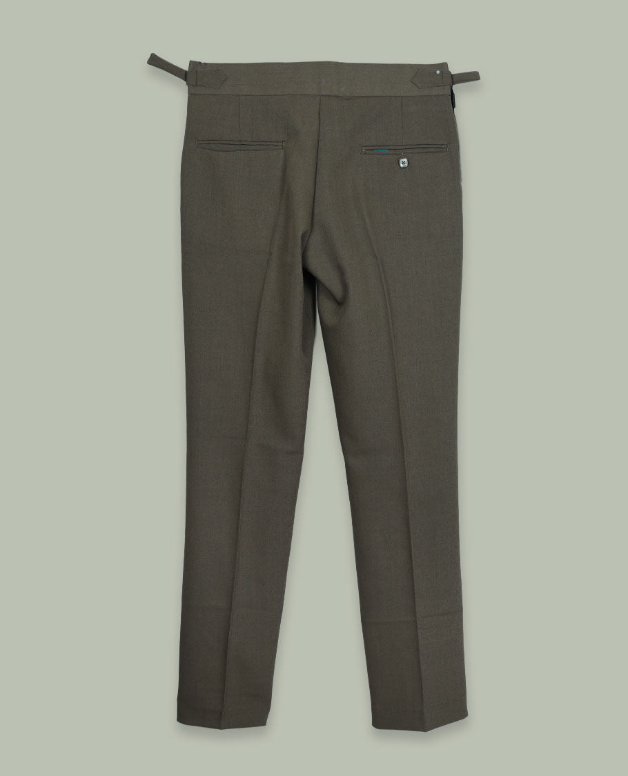 Dusty olive colour men’s pant featuring a clean waistband with side buckle adjusters, neat front pleats, slant pockets and back welt pockets, finished with a straight leg fit.