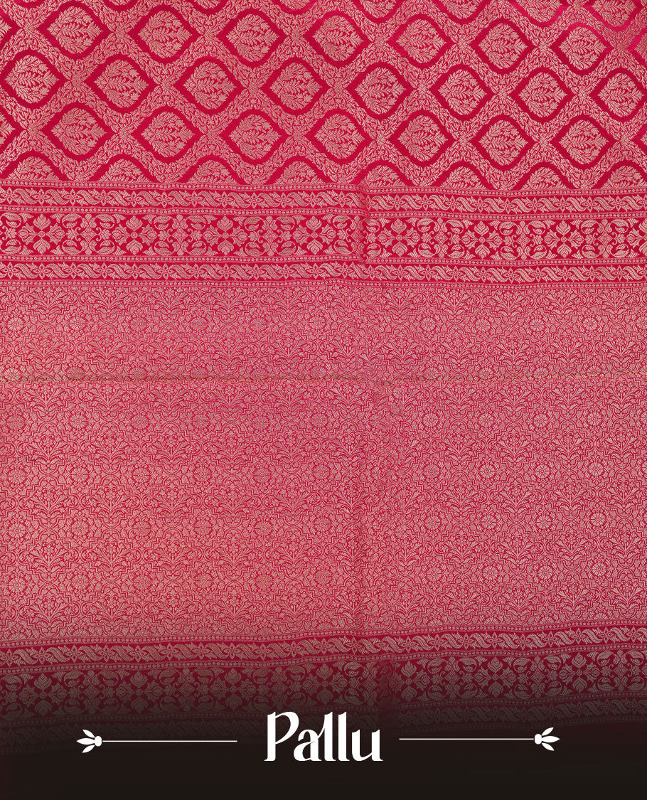 Rani pink colour banaras satin crepe saree featuring gold zari pattern across body, with self colour border with gold zari pattern and paired with matching blouse.