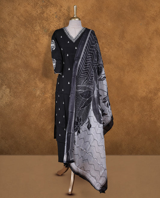Black colour churidar set featuring thread embroidered pattern neckline, sleeves, and  body , Paired with a matching dupatta