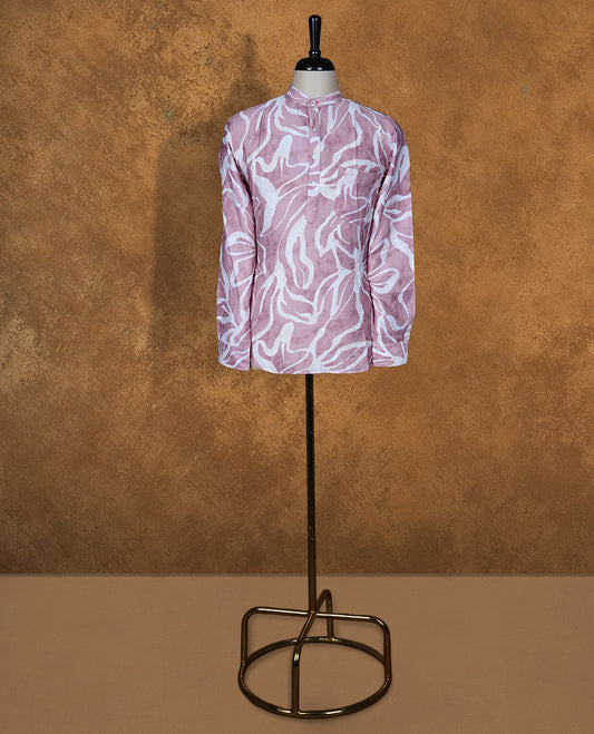 Dusty pink kurta featuring an all-over abstract leaf print, designed with a mandarin collar and buttoned placket, crafted from lightweight, breathable fabric for everyday comfort.