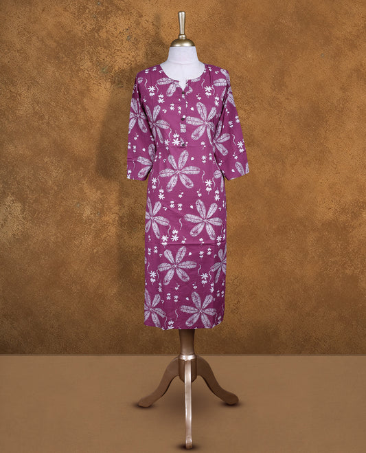 Mauve colour Kurti featuring floral print pattern across,  round neckline with split, and sleeves,