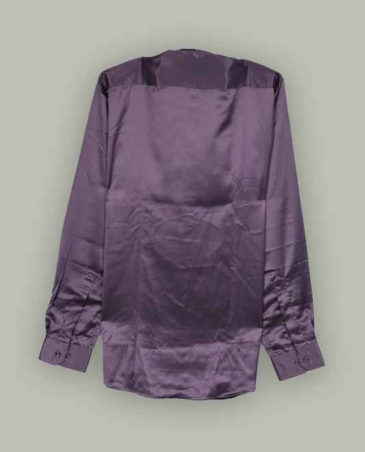 Rich purple colour satin shirt with a glossy finish, featuring a classic collar and full sleeves with broad cuffs, Designed with a front pocket and button-down style, adding a refined touch to formal or party looks.