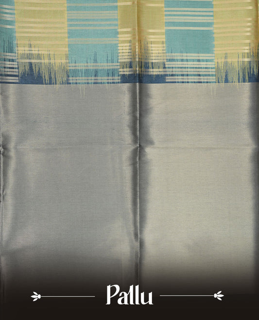 Green and light teal colour semi tussar silk saree, featuring an intricate gold zari stripes on body and pallu , comes with matching blouse.